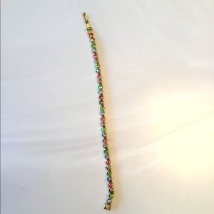 Bracelet 7” length, gold color over sterling silver